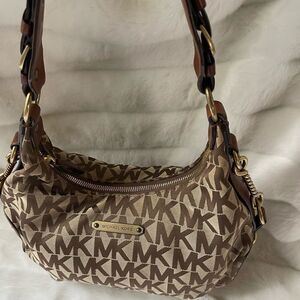 Michael Kors  vintage Canvas khaki & brown logo shoulder bag with leather trim .